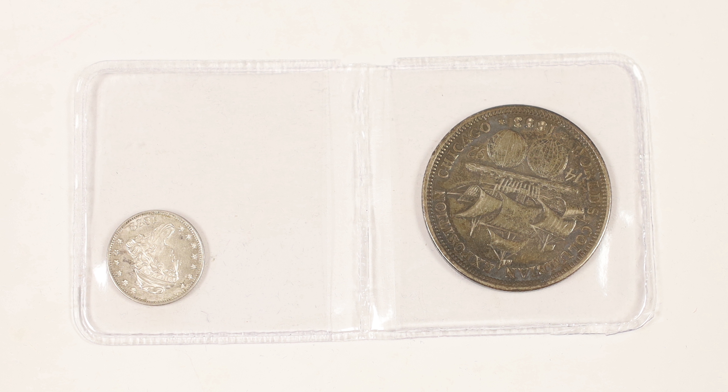 U.S. coins, 5 cents (Liberty Cap half dime) 1829, EF and a Columbian half dollar, 1893 (2)